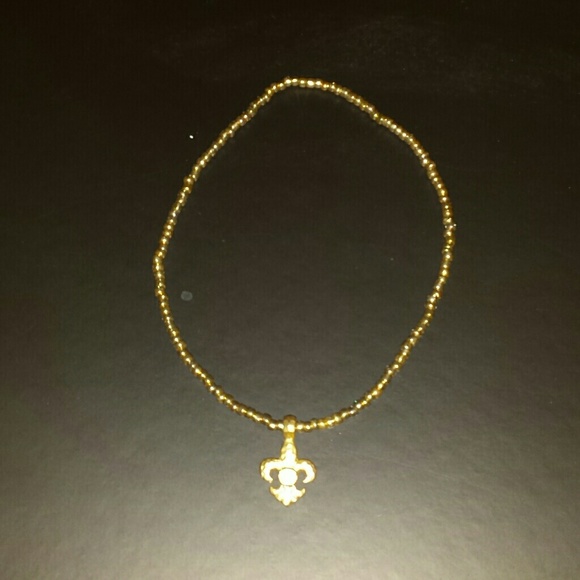 Golden Fleur De Lis necklace