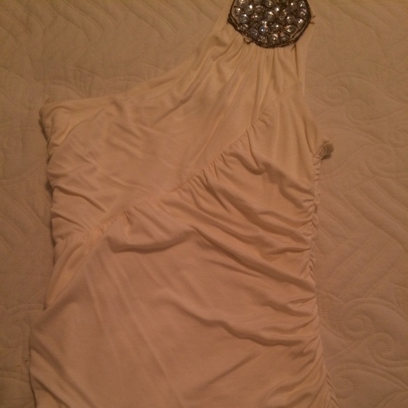 Ivory shirt.