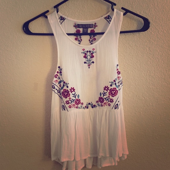 Embroidered racerback peplum top