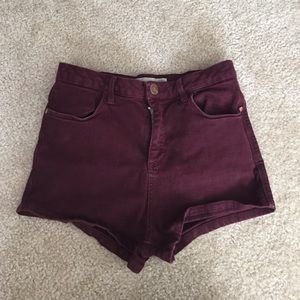 High waisted maroon shorts