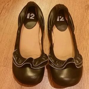 R2 black flats with ruffled zipper. 8.5