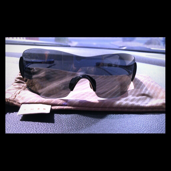 1 pair of Oakley Sunglasses for Women