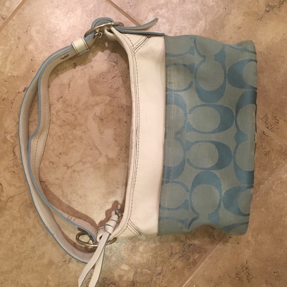 cream coach purse