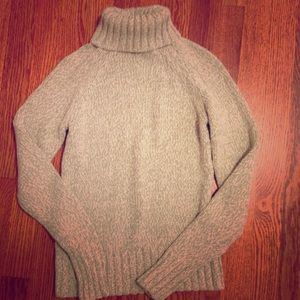 Green and white turtleneck sweater