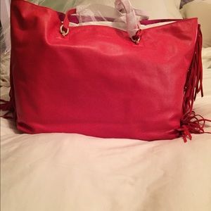 Paprika colored tote made with leather