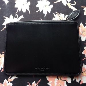 Alaia cosmetic clutch