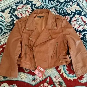 FAUX LEATHER JACKET.  NEVER WORN.
