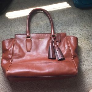 Medium brown leather coach bag