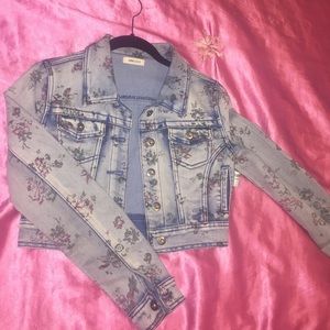Jean Jacket with flower patterns.