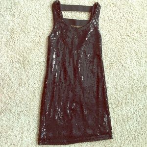 Black full sequin dress with partially open back