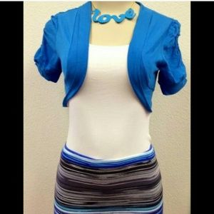 Cami, jacket, and mini skirt