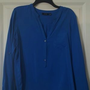 Blue mid button up blouse.
