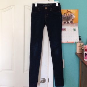 Dark blue wash AE jeggings