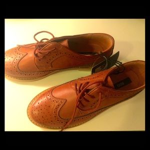 Light brown BDG loafers with classic detailing