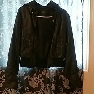 Black jacket with removable hoodie .