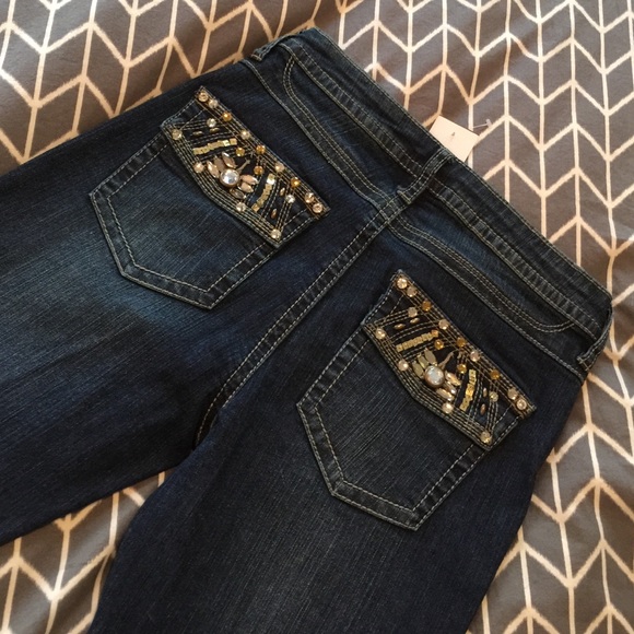 Cache jeans, new, with tags.  Size 4
