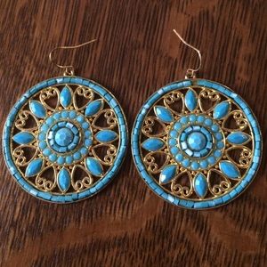 Turquoise and gold round earrings.