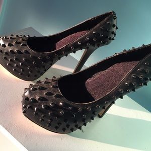 Black studded pumps