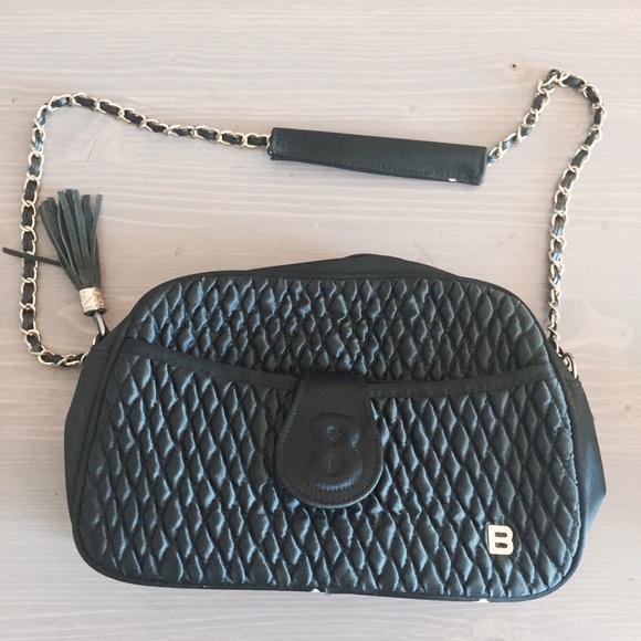 Black purse with gold trim