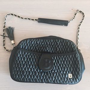 Black purse with gold trim