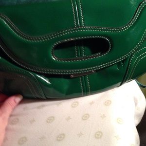 Small green patent clutch.