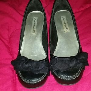 Small wedge heal black dress shoes