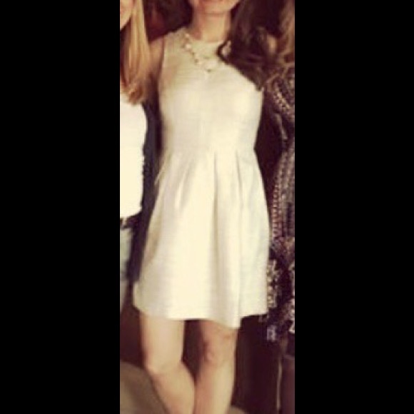 Very classy off white with touches of gold dress!
