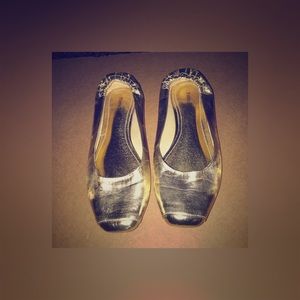 SOLD....Gold flats ( Never worn)