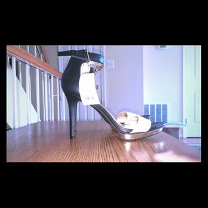 Black and white ankle strap heels