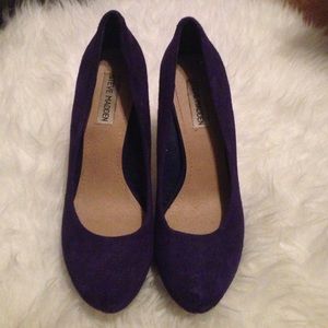 Colbalt blue suede pumps.