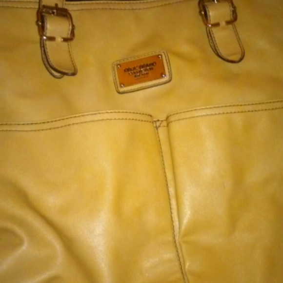 Butterscotch cream color Relic bag.