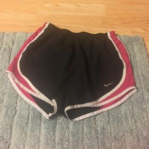 Nike Tempo shorts in black with pink/white detail