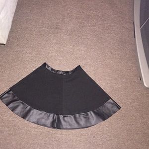 Black leather trimmed circle skirt
