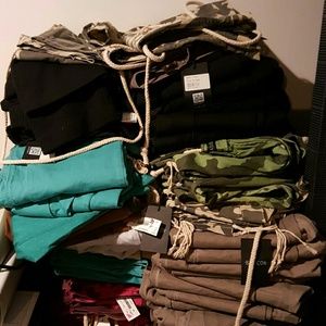 50 pairs of designer pants. I will update info tom