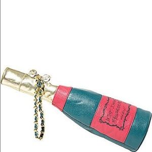 Sold:  Betsey Johnson champagne bag