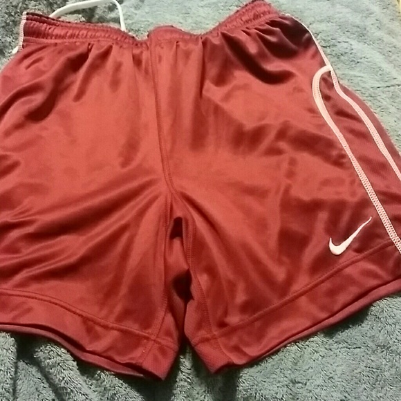 Burgundy Nike running shorts