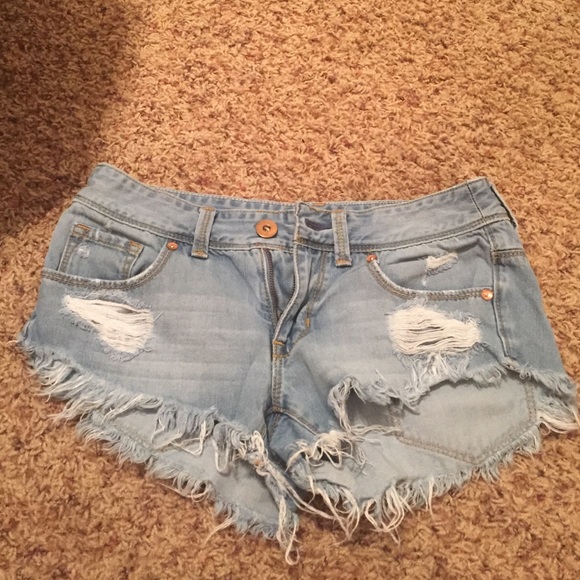 Torn denim jean shorts