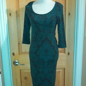 3/4 sleeve, knee length dress with scoop neck
