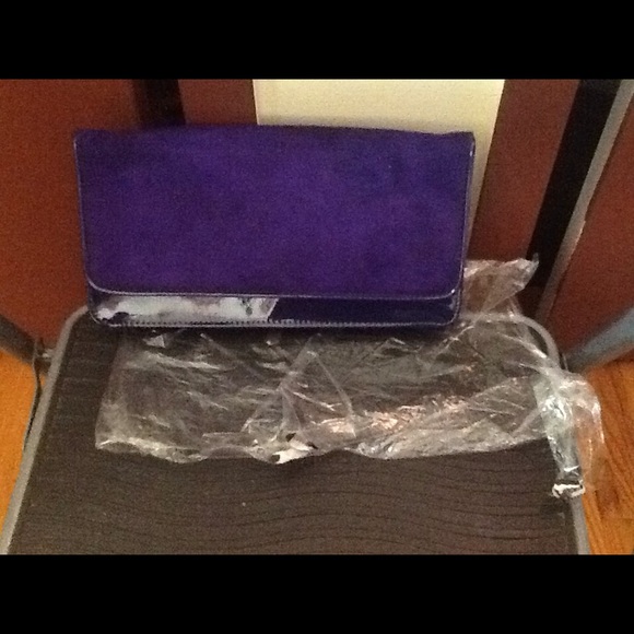 Suede and patent leather clutch