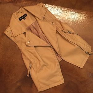 Faux leather vest. WORN ONCE FOR A PHOTOSHOOT.