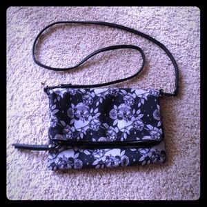 Skull and rose cross body fold handbag