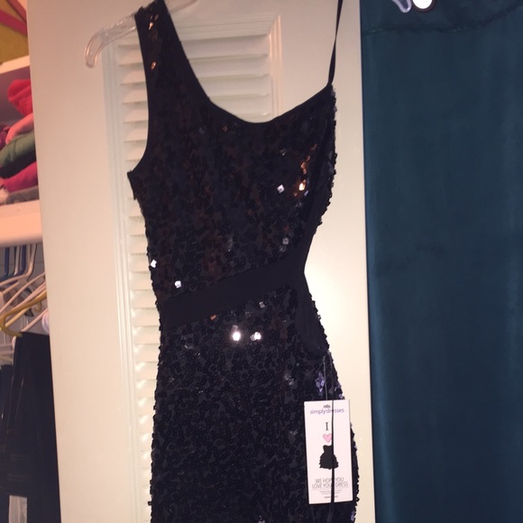 Black sequined dress. Never worn. Tags still on