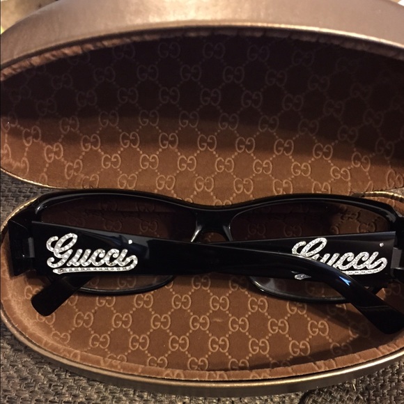 “SOLD”.  Gucci black glasses