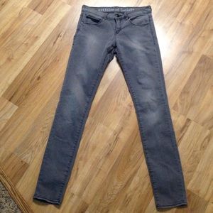 Grey Articles of Society jeggings.