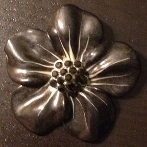 Black flower pin