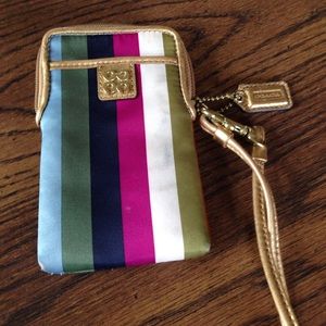 Coach striped wristlet