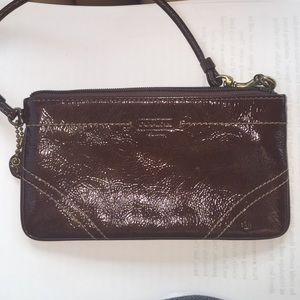 Brown patten leather coach clutch never used
