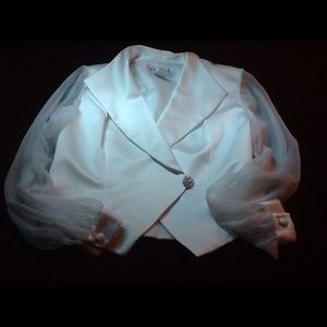 White Satin bodice with see-through sleeves.