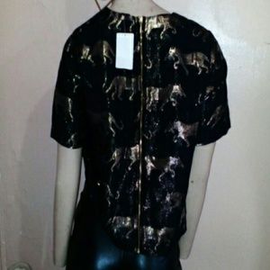 Black with gold speck and gold tiger swing top