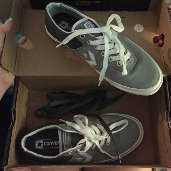 Gray and white converse shoes